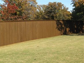 recently stained fence in Plano area